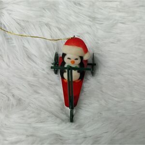 Vintage 80s Avon Jolly Penguin On Scooter with Santa Hat Christmas Ornament